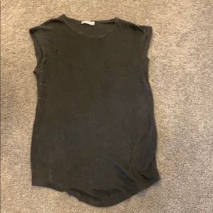 Distressed, sleeveless tee shirt